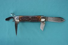 Cattaraugus scout knife with Compass Bone handles faint etch Cattaraugus scout knife with Compass Bone handles faint etch