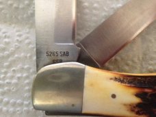 Case XX Stainless USA 6265 SAB SSP three dots; stag handle; engraved scroll Case XX Stainless USA 6265 SAB SSP three dots; stag handle; engraved scroll