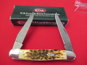 Case XX  Burnt Amber Bone Handle  Damacus Muskrat 