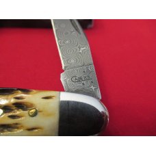 Case XX  Burnt Amber Bone Handle  Damacus Muskrat 