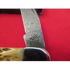 Case XX  Burnt Amber Bone Handle  Damacus Muskrat 
