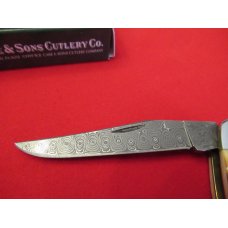 Case XX  Burnt Amber Bone Handle  Damacus Muskrat 