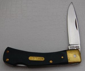 Schrade with Green Sawcut Synthetic Covers In Excellent Condition (799)