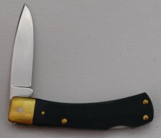 Schrade with Green Sawcut Synthetic Covers In Excellent Condition (799) Schrade with Green Sawcut Synthetic Covers In Excellent Condition (799)