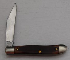Schrade with Brown Sawcut Synthetic Covers In Very Good Condition (828) Schrade with Brown Sawcut Synthetic Covers In Very Good Condition (828)