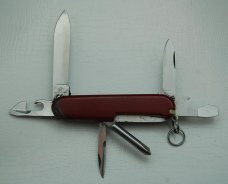 Victorinox with Smooth Red Synthetic Covers In Very Good Condition (863) Victorinox with Smooth Red Synthetic Covers In Very Good Condition (863)