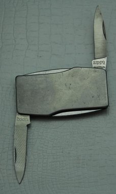 Zippo with Stainless Steel Covers In Very Good Condition (880) Zippo with Stainless Steel Covers In Very Good Condition (880)