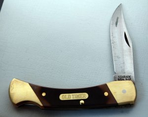 Schrade with Brown Sawcut Delrin Covers In Excellent Condition (924)