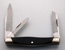 Buck with Black Sawcut Delrin Covers In Excellent Condition (914) Buck with Black Sawcut Delrin Covers In Excellent Condition (914)