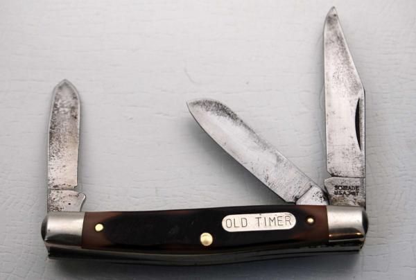 Schrade with Brown Sawcut Delrin Covers In Excellent Condition (913)