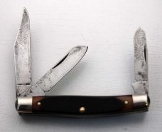 Schrade with Brown Sawcut Delrin Covers In Excellent Condition (913)