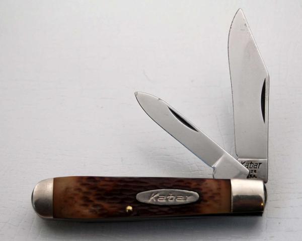 Kabar with Amber Jigged Delrin Covers In Excellent Condition (912) Kabar with Amber Jigged Delrin Covers In Excellent Condition (912)
