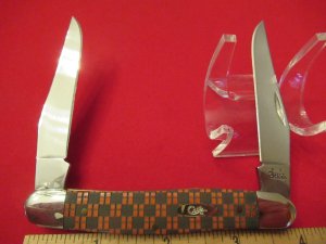 Case XX 2006 Lazer Red Bone Handles Muskart Pattern 