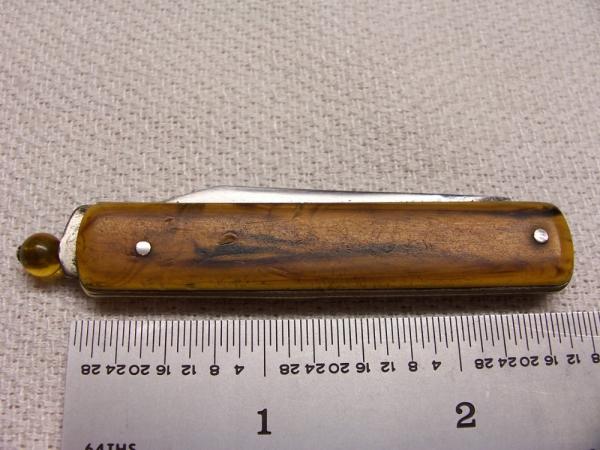 G. SCHRADE BALL PULL AUTOMATIC/ SWITCHBLADE - BUTTER AND MOLASSES HANDLES G. SCHRADE BALL PULL AUTOMATIC/ SWITCHBLADE - BUTTER AND MOLASSES HANDLES