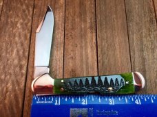 Just  in time for Christmas.  Case Dark Green Christmas Tree Jigged Bone Copperlock.