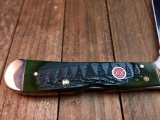 Just  in time for Christmas.  Case Dark Green Christmas Tree Jigged Bone Copperlock.