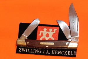 J A Henckels 3 Blade Stockman with Wood Handles and some blade etching- Nice one to use or admire!
