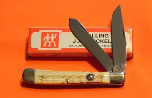 Vintage, J A Henckels 2 Blade Trapper with Torched Natural Bone Handles w/ Black Shield - NOS +Box