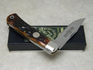 Queen Cutlery Co. Titusville PA. #3L ACSB Amber Carved Stag Bone Mountain Man Lockback Knife in Box