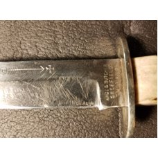 Late 1890's -early 1900's Wade and Butcher Bowie with original scabbard. "Bowie" etch still visible 
