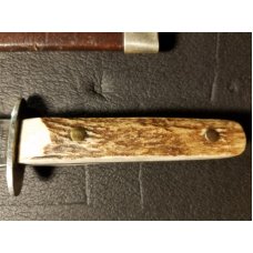 Late 1890's -early 1900's Wade and Butcher Bowie with original scabbard. "Bowie" etch still visible 