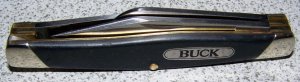 Buck 301 1987 Black Saw Cut Derlin Handle