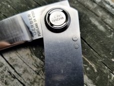 GERBER PAUL 2P AXIAL FOLDING LOCK BACK KNIFE STAINLESS HANDLE PREOWNED VG+ TO EXCELLENT GERBER PAUL 2P AXIAL FOLDING LOCK BACK KNIFE STAINLESS HANDLE PREOWNED VG+ TO EXCELLENT