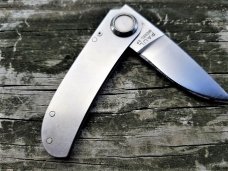 GERBER PAUL 2P AXIAL FOLDING LOCK BACK KNIFE STAINLESS HANDLE PREOWNED VG+ TO EXCELLENT GERBER PAUL 2P AXIAL FOLDING LOCK BACK KNIFE STAINLESS HANDLE PREOWNED VG+ TO EXCELLENT