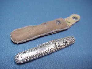 Schrade Cut Co German Silver Small double switchblade with leather purse