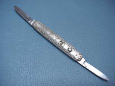 Schrade Cut Co German Silver Small double switchblade with leather purse Schrade Cut Co German Silver Small double switchblade with leather purse