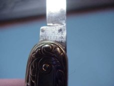 Schrade Cut Co German Silver Small double switchblade with leather purse Schrade Cut Co German Silver Small double switchblade with leather purse