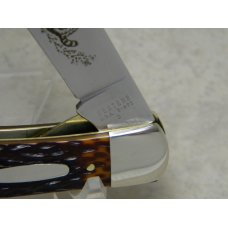 Western USA S-693 D Jigged Delrin Linerlock 1 Blade Trapper Knife with Raccoon Etch c.1980 Western USA S-693 D Jigged Delrin Linerlock 1 Blade Trapper Knife with Raccoon Etch c.1980