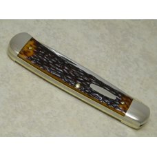 Western USA S-693 D Jigged Delrin Linerlock 1 Blade Trapper Knife with Raccoon Etch c.1980 Western USA S-693 D Jigged Delrin Linerlock 1 Blade Trapper Knife with Raccoon Etch c.1980
