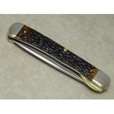 Western USA S-693 D Jigged Delrin Linerlock 1 Blade Trapper Knife with Raccoon Etch c.1980 Western USA S-693 D Jigged Delrin Linerlock 1 Blade Trapper Knife with Raccoon Etch c.1980