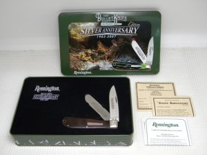 Remington Bullet 1982 - 2007 Cocobolo R1128 Silver Anniversary Trapper Knife in Tin
