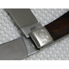 Remington Bullet 1982 - 2007 Cocobolo R1128 Silver Anniversary Trapper Knife in Tin Remington Bullet 1982 - 2007 Cocobolo R1128 Silver Anniversary Trapper Knife in Tin