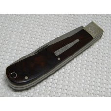 Remington Bullet 1982 - 2007 Cocobolo R1128 Silver Anniversary Trapper Knife in Tin Remington Bullet 1982 - 2007 Cocobolo R1128 Silver Anniversary Trapper Knife in Tin