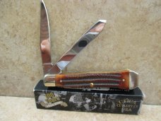 Utica Trapper Brown Jigged Bone with Coffin Bolsters Utica Trapper Brown Jigged Bone with Coffin Bolsters