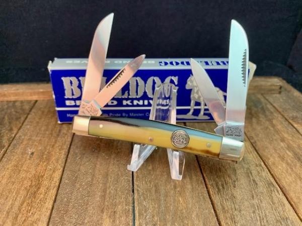 Bulldog 4 Blade Congress in Striking Coon Stripe Celluloid, 1995 Stamp w/ Fighting Bulldogs Bulldog 4 Blade Congress in Striking Coon Stripe Celluloid, 1995 Stamp w/ Fighting Bulldogs