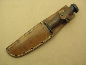 Camillus Cutlery, NY, U. S Navy Mark 1 WWII fighting knife with leather sheath: ’