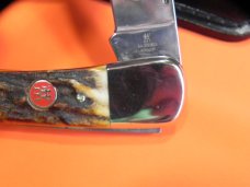J A Henckels Lg 5" Folding Hunter (HK19-S) with Great Stag Handles & Gold Scroll Blade Etch +Sheath J A Henckels Lg 5" Folding Hunter (HK19-S) with Great Stag Handles & Gold Scroll Blade Etch +Sheath