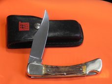 J A Henckels Lg 5" Folding Hunter (HK19-S) with Great Stag Handles & Gold Scroll Blade Etch +Sheath J A Henckels Lg 5" Folding Hunter (HK19-S) with Great Stag Handles & Gold Scroll Blade Etch +Sheath