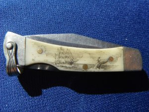 Vintage Frost Single Blade Lock back knife with Highly Detailed Scrimshaw Ship chasing a whale scene