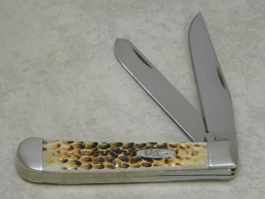Case XX USA 2015 Burnt Jigged Amber Bone 6254 154-CM Trapper Knife