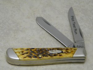 Case XX USA 2016 Burnt Jigged Amber Bone 6207 SS "Pilot Test Run" Mini Trapper Knife