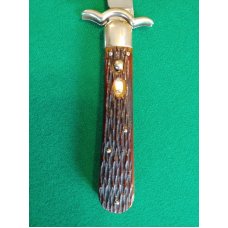 Presto switchblade knife with the lazy W guard Presto switchblade knife with the lazy W guard