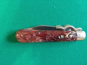 Presto switchblade knife with the lazy W guard