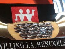 Hard to find.. J A Henckels Folding 4 & 1/2" Hunter Knife w/ Fossil Ivory Handles - NOS in Orig Box Hard to find.. J A Henckels Folding 4 & 1/2" Hunter Knife w/ Fossil Ivory Handles - NOS in Orig Box