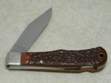Remington UMC USA Model R1303 Delrin Bullet Lockback Knife Remington UMC USA Model R1303 Delrin Bullet Lockback Knife