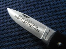 Smith & Wesson, S&W pocket knife marked "First Production Run" & "Performance"  Scrimshaw Deer scene